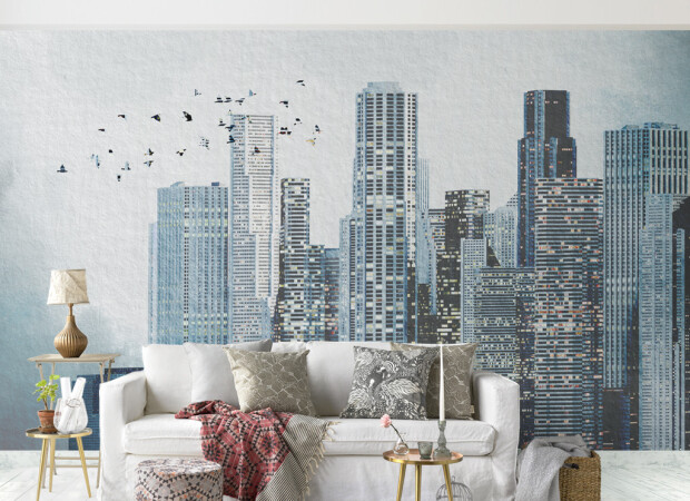 Зграя птахів над хмарочосом